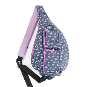 MERU Sling backpack. Blue w/purple accents. bicycle pattern. Lightly used